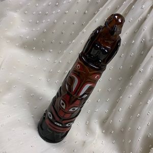 Avon totem pole wild country after shave bottle (mostly full) shaped bottle.